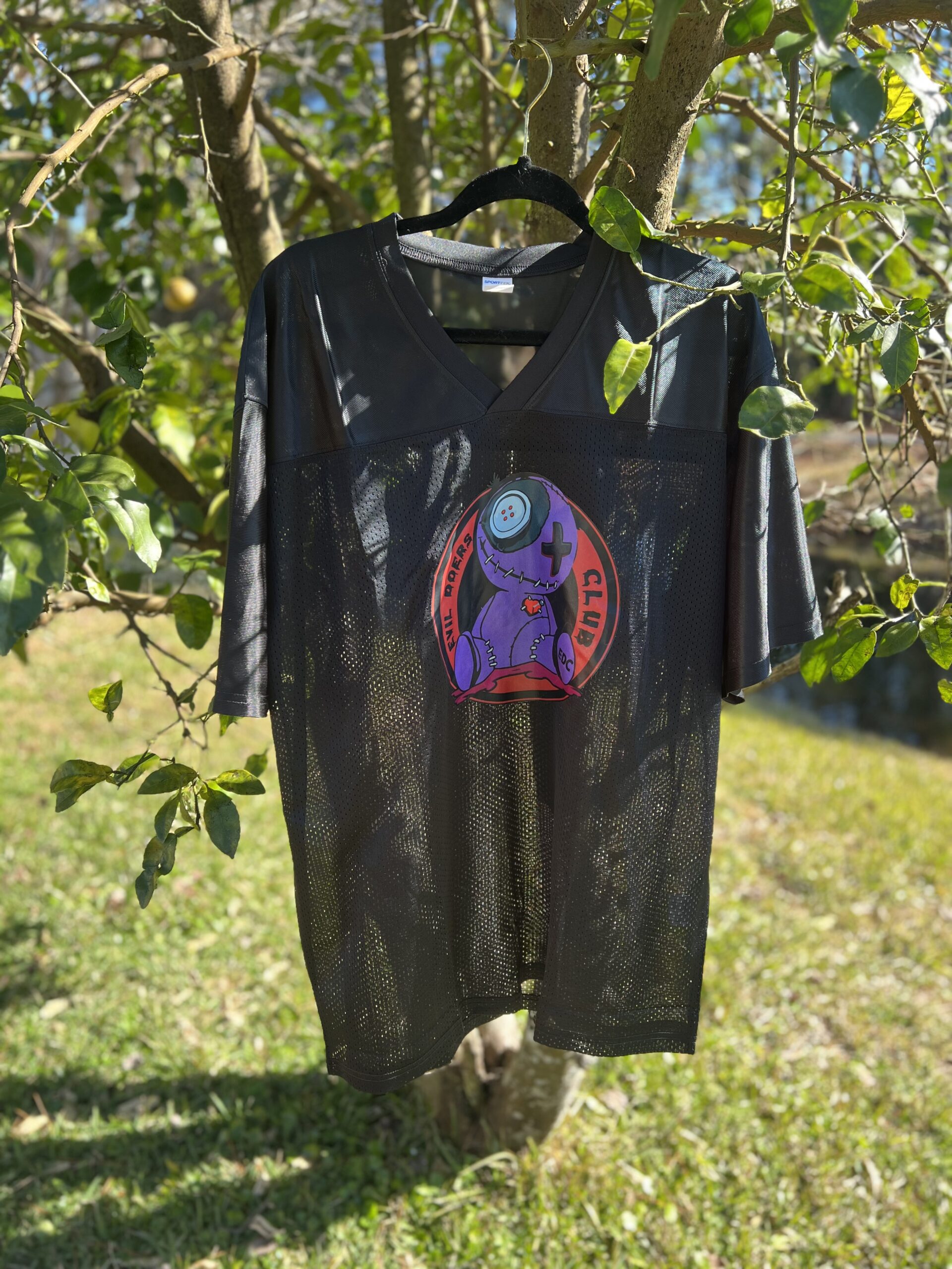 Black Jersey With Circular Voodoo Doll Logo